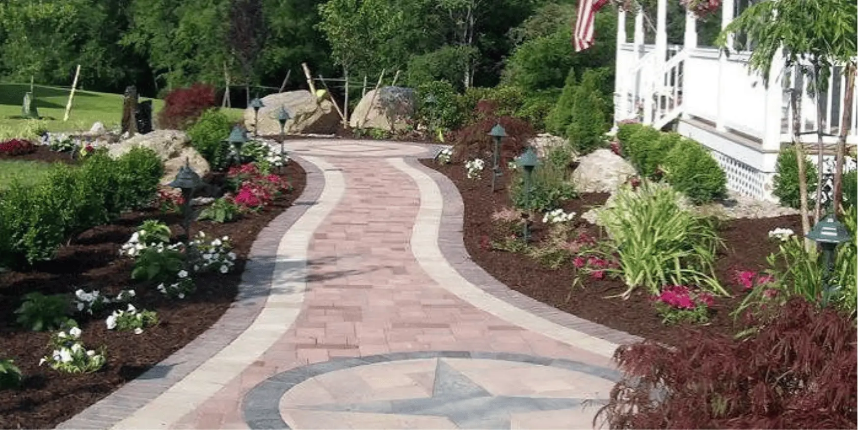 Flagstone front entry walkway and backyard path in a Lubbock yard