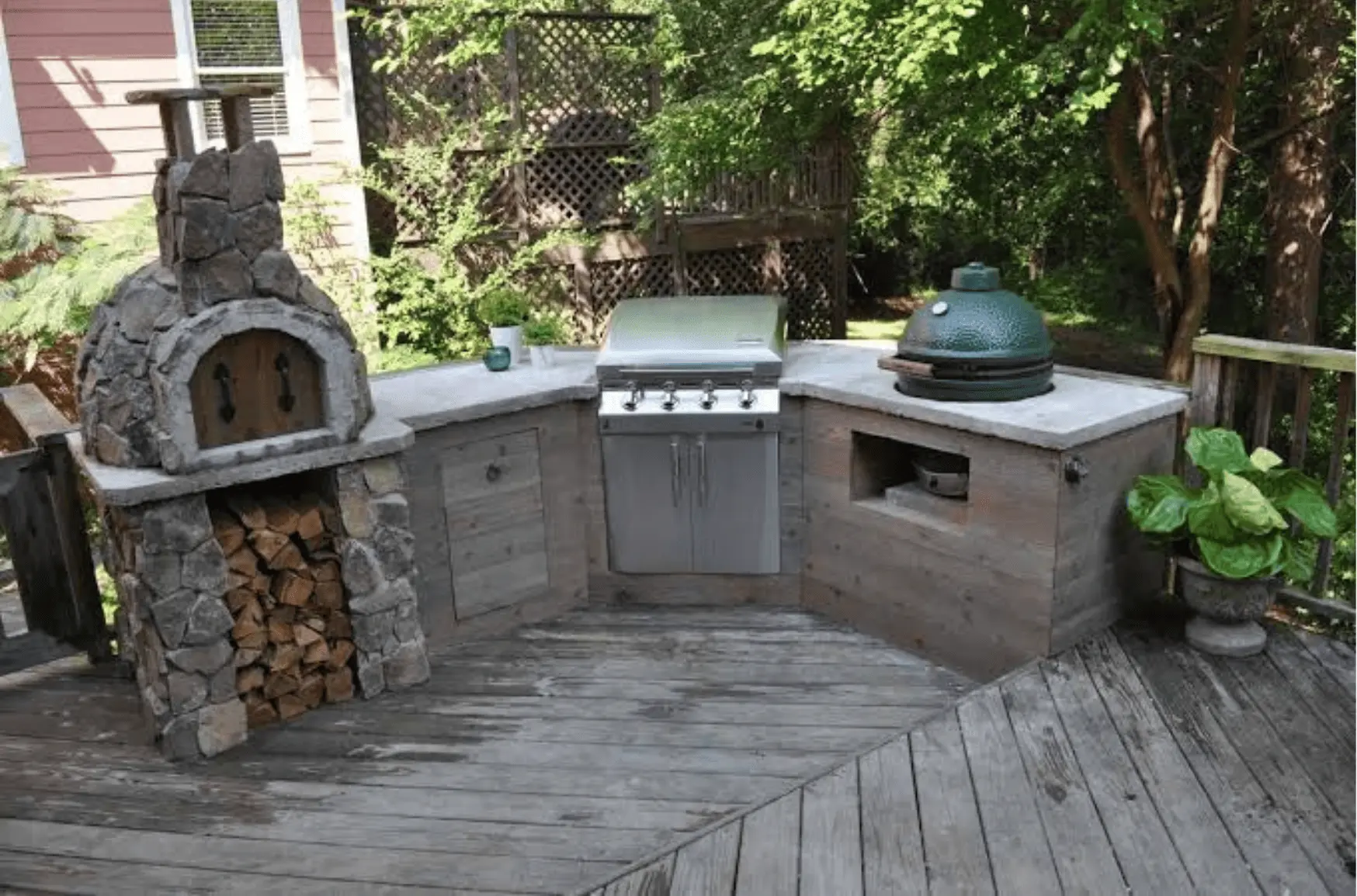 Outdoor kitchen with stone counters built in a Lubbock backyard