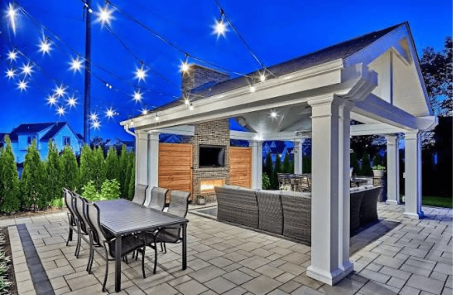 Wooden pergola shade structure over a paver patio in Lubbock TX